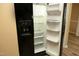 Spacious refrigerator with plenty of shelving and water dispenser at 3521 Piedmont Dr, Raleigh, NC 27604