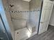 Newly renovated bathroom with tiled shower and a safety bar at 3785 Little Creek Church Rd, Clayton, NC 27520