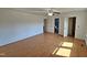 Bright bedroom features wood floors with access to bathroom and another room at 3785 Little Creek Church Rd, Clayton, NC 27520