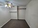 Bedroom featuring neutral paint and carpet and closet with shelving at 3785 Little Creek Church Rd, Clayton, NC 27520