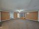 Spacious living room with neutral carpeting and a ceiling fan at 3785 Little Creek Church Rd, Clayton, NC 27520
