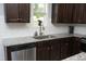 Well-maintained kitchen with granite countertops, stainless steel appliances, and subway tile backsplash at 39 Principal Way, Clayton, NC 27520