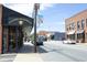A vibrant street scene with shops and restaurants in downtown Clayton, North Carolina at 39 Principal Way, Clayton, NC 27520