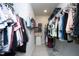 Spacious walk-in closet with ample hanging space and shelving for organized storage at 39 Principal Way, Clayton, NC 27520