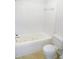 Clean, white bathroom featuring a jetted tub and toilet with tile flooring at 403 Gooseneck Dr # A-1, Cary, NC 27513