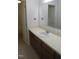 Neutral bathroom featuring a large vanity and a big mirror at 403 Gooseneck Dr # A-1, Cary, NC 27513