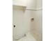 Bright laundry room ready for finishing with white walls and marble-look floors at 403 Gooseneck Dr # A-1, Cary, NC 27513