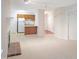 Spacious living area offering a fireplace, ceiling fan and seamless flow to the kitchen at 403 Gooseneck Dr # A-1, Cary, NC 27513