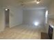 Bright living room with plush carpet, fireplace, and natural light at 403 Gooseneck Dr # A-1, Cary, NC 27513