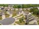 An aerial shot of a well-maintained community with large lawns and attractive residential architecture at 404 Lily Pad Ct, Zebulon, NC 27597