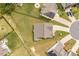 Residential neighborhood, with a well maintained roof, landscaping, and a paved driveway at 404 Lily Pad Ct, Zebulon, NC 27597