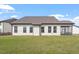 A spacious backyard with lush green grass, perfect for outdoor activities and relaxation at 404 Lily Pad Ct, Zebulon, NC 27597