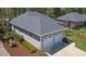 Aerial view of a lovely single-story house with a two car garage, showcasing the well-maintained exterior at 4331 Millcreek Cir, Pittsboro, NC 27312