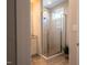 Bathroom with a glass-enclosed shower and tile flooring at 4331 Millcreek Cir, Pittsboro, NC 27312