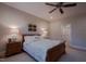 Cozy bedroom features wood floors, a ceiling fan and neutral decor creating a relaxing atmosphere at 4331 Millcreek Cir, Pittsboro, NC 27312