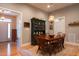Inviting dining room with hardwood floors, an antique hutch and an ornate chandelier at 4331 Millcreek Cir, Pittsboro, NC 27312