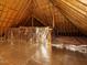 Unfinished attic space, revealing wooden beams and a partially insulated interior at 4501 Forest Dr, Holly Springs, NC 27540