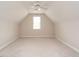 Spacious bedroom featuring carpet and a window providing natural light at 4501 Forest Dr, Holly Springs, NC 27540