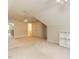 Large bonus room featuring carpet and an entryway to another room at 4501 Forest Dr, Holly Springs, NC 27540