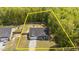 Overhead image showcases property lines, fenced-in backyard, mature trees, and neighbor's house at 479 Kotata Ave, Bunnlevel, NC 28323