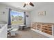 Bedroom featuring a dresser, reading chair, decor and a window with a view at 479 Kotata Ave, Bunnlevel, NC 28323