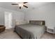 This bedroom features a queen size bed, neutral carpeting and an open doorway at 479 Kotata Ave, Bunnlevel, NC 28323