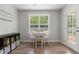 Dining area features a bright window with backyard view and a small table with chairs at 479 Kotata Ave, Bunnlevel, NC 28323