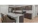 A kitchen is complete with stainless steel appliances and granite countertops at 479 Kotata Ave, Bunnlevel, NC 28323