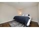 Serene bedroom features hardwood floors and modern decor at 48 Fashion Pl, Durham, NC 27705