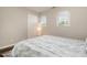 Charming bedroom boasts two sunny windows and hardwood floors at 48 Fashion Pl, Durham, NC 27705