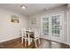 Cozy dining area with seating for four and natural light from the patio doors at 48 Fashion Pl, Durham, NC 27705