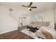 Bright living room with a comfortable sectional sofa, hardwood floors, and neutral walls at 48 Fashion Pl, Durham, NC 27705