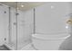 Elegant bathroom featuring a modern glass shower and freestanding tub for a luxurious bathing experience at 501 Mallard Ave, Durham, NC 27701