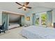 Inviting bedroom featuring a cozy sleeping nook, bright windows with curtains, and plenty of space at 501 Mallard Ave, Durham, NC 27701