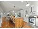 Spacious kitchen with a large wood island, stainless steel appliances, and an open layout at 501 Mallard Ave, Durham, NC 27701