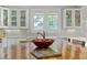 Close-up of kitchen island showcasing wooden countertop and white cabinetry at 501 Mallard Ave, Durham, NC 27701