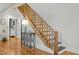 Charming staircase with wooden railing and treads, leading to the upper level at 501 Mallard Ave, Durham, NC 27701