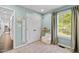 Cozy bedroom with plush chair, large window, and ample closet space, perfect for relaxation at 5525 Sandy Trail Dr, Knightdale, NC 27545