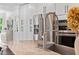 Kitchen sink with stainless steel faucet, granite countertops, and stainless steel fridge and oven at 5525 Sandy Trail Dr, Knightdale, NC 27545