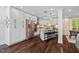 Spacious kitchen with stainless steel appliances, white cabinets, and central island at 5525 Sandy Trail Dr, Knightdale, NC 27545