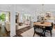 Open-concept living area with fireplace, dining space, and modern kitchen at 5525 Sandy Trail Dr, Knightdale, NC 27545