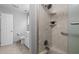 Bright bathroom with tiled floors, neutral paint, white vanity, and shower stall at 608 Valen Ct, Chapel Hill, NC 27516