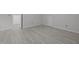 Spacious bedroom featuring neutral paint, vinyl floors, and modern trim at 608 Valen Ct, Chapel Hill, NC 27516