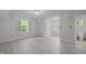 Spacious bedroom features hardwood floors, natural light from large windows, and an attached bathroom at 608 Valen Ct, Chapel Hill, NC 27516