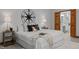 Main bedroom showing a bed and nightstand next to the entrance to the bathroom at 608 Valen Ct, Chapel Hill, NC 27516