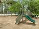 Community playground featuring slides, climbing structure, and a swing set with tennis court in the background at 608 Valen Ct, Chapel Hill, NC 27516