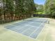 An aerial shot of the community tennis court for residents at 608 Valen Ct, Chapel Hill, NC 27516