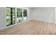 Bedroom featuring three windows with a view at 6421 Arrington Rd, Raleigh, NC 27607