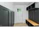 Entryway featuring a bench and coat rack with a view of the door at 6421 Arrington Rd, Raleigh, NC 27607