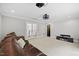 Bright media room with plush seating, projector, and entertainment center, perfect for movie nights and relaxation at 6819 Rainwater Rd, Raleigh, NC 27615